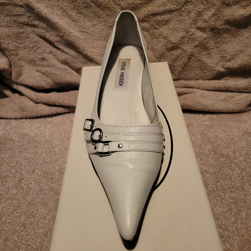 White leather loafers